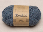 Close-up of denim blue-gray yarn with a tweedy texture