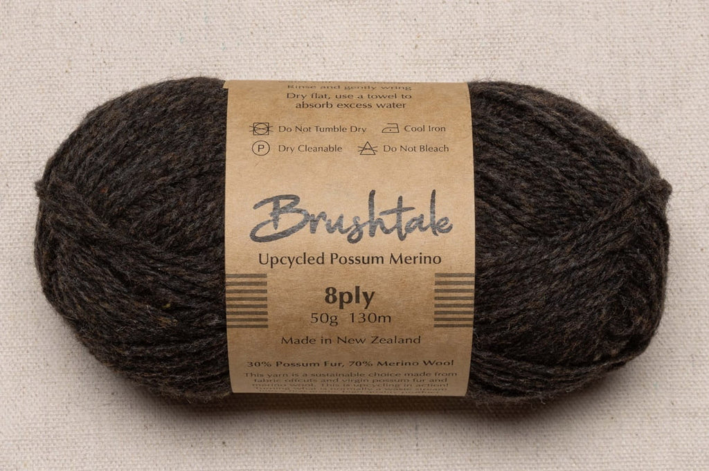 Close-up of dark brown-grey with a tweedy texture