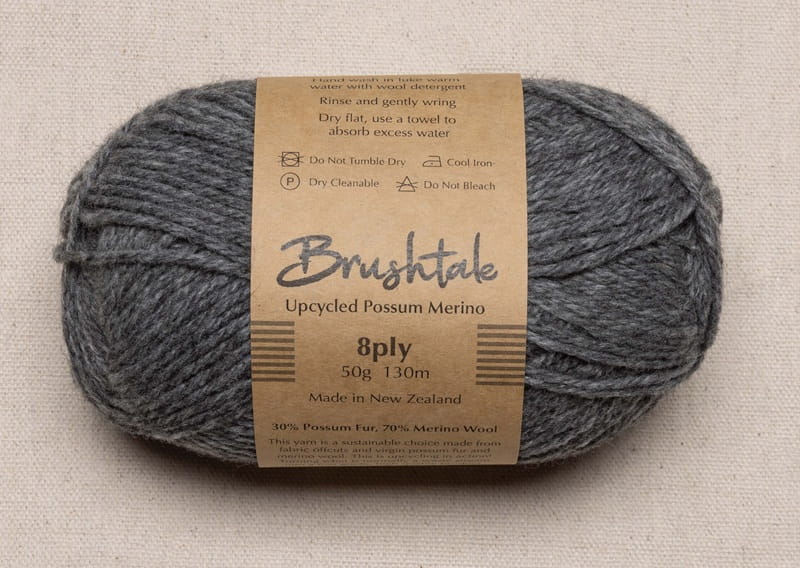 Close-up of medium gray yarn with a tweedy texture
