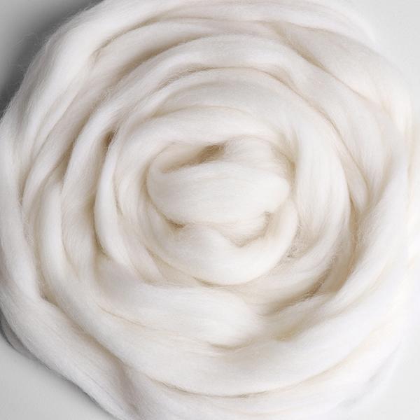 Sample of white unspun fibre for use in spinning or felting