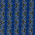 A Quilt fabric featuring the Maori Koru design in black and white on a blue background.