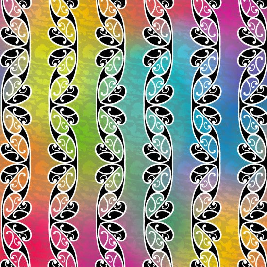 A Quilt fabric featuring the Maori Koru design in black and white on a colorful rainbow background.