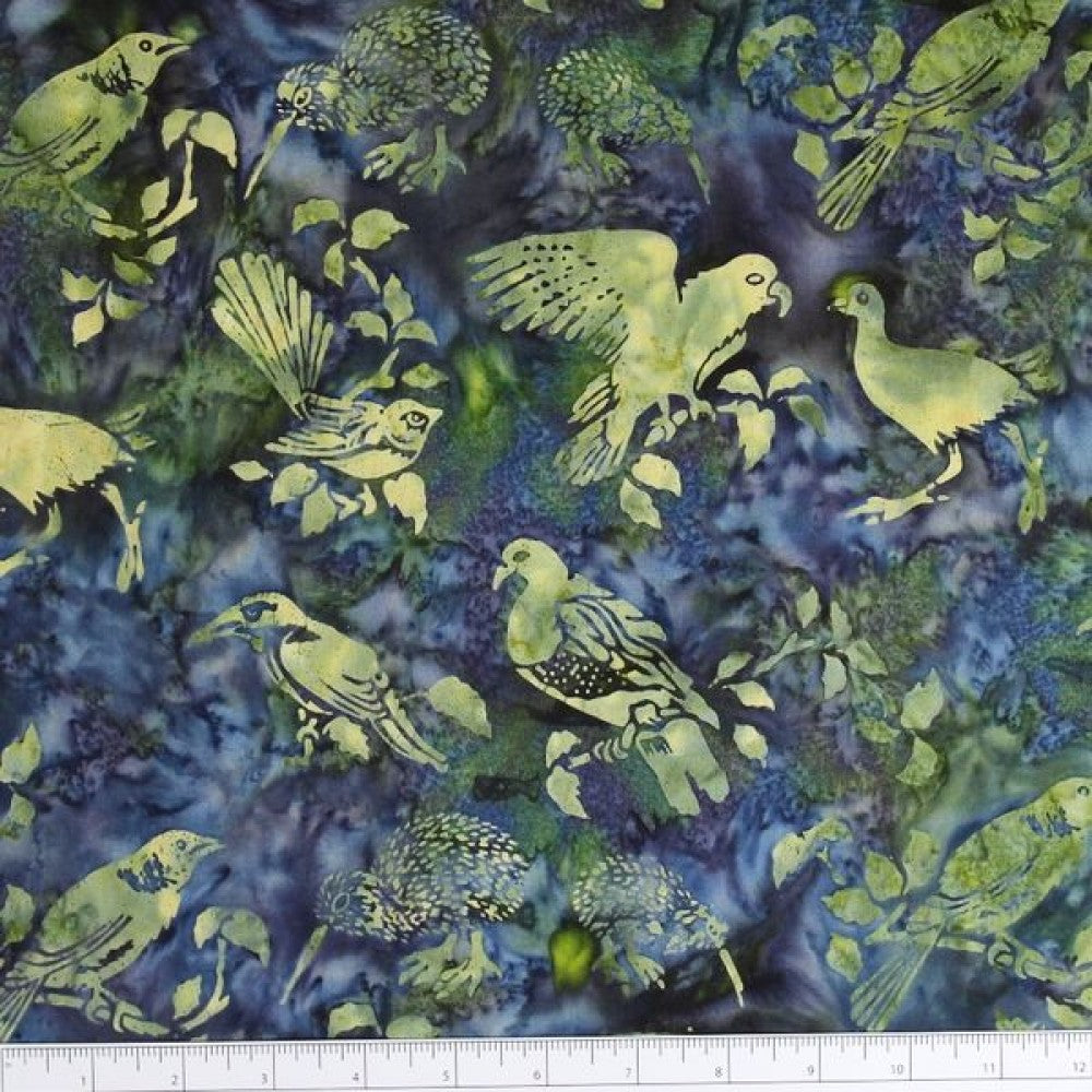 New Zealand designed quilt fabric with birds and floral elements on a textured background in blues & greens