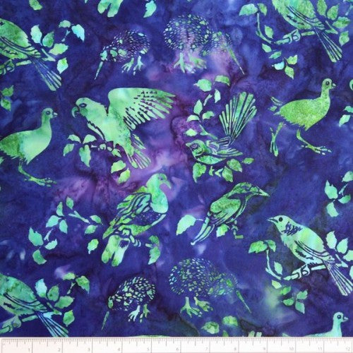 New Zealand designed quilt fabric with birds and floral elements on a textured background of turquoise blue and green