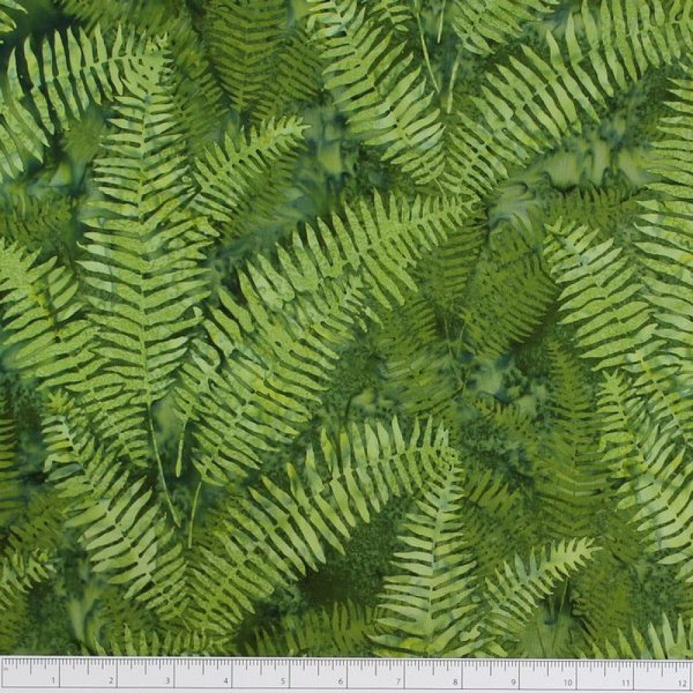 New Zealand designed quilt fabric with ferns on a textured background in shades of yellow and green