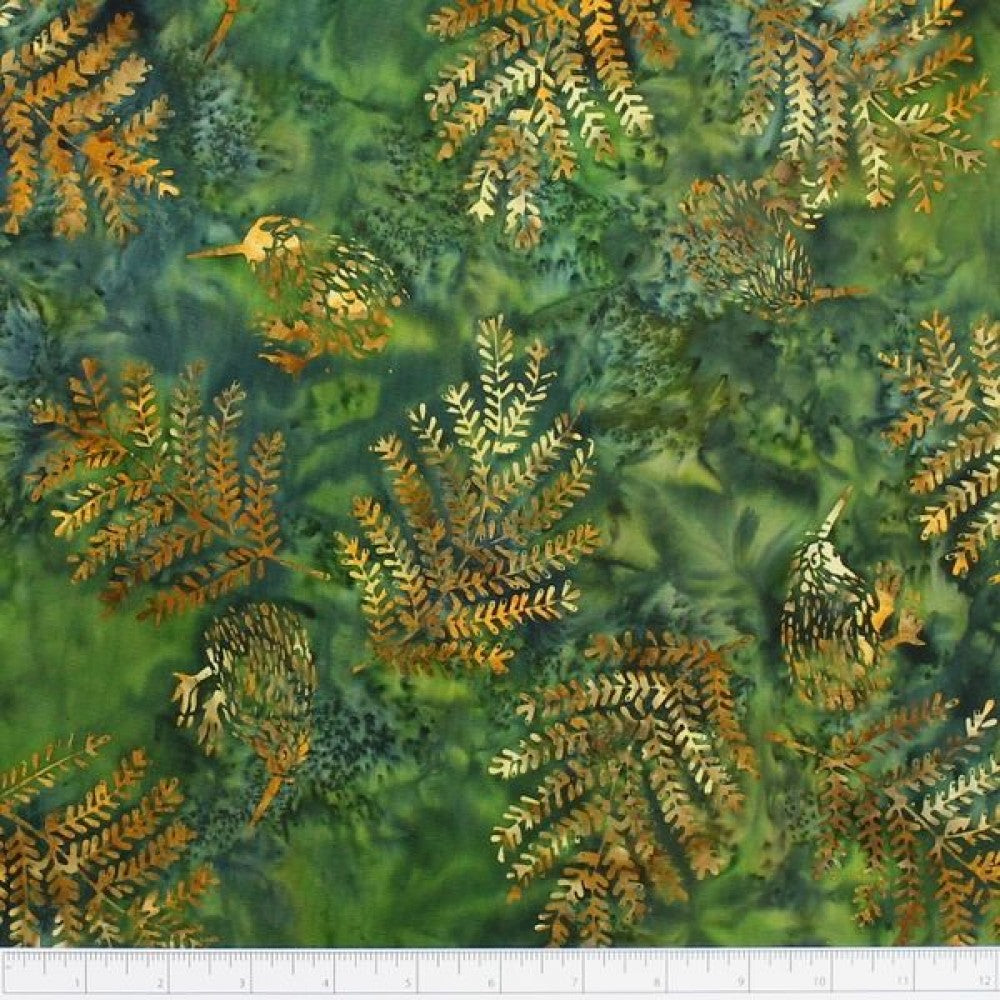 New Zealand designed quilt fabric with Kiwi birds and ferns on a textured background in oranges and greens