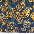 New Zealand designed quilt fabric with Maori style leaf design in rusty orange on navy blue