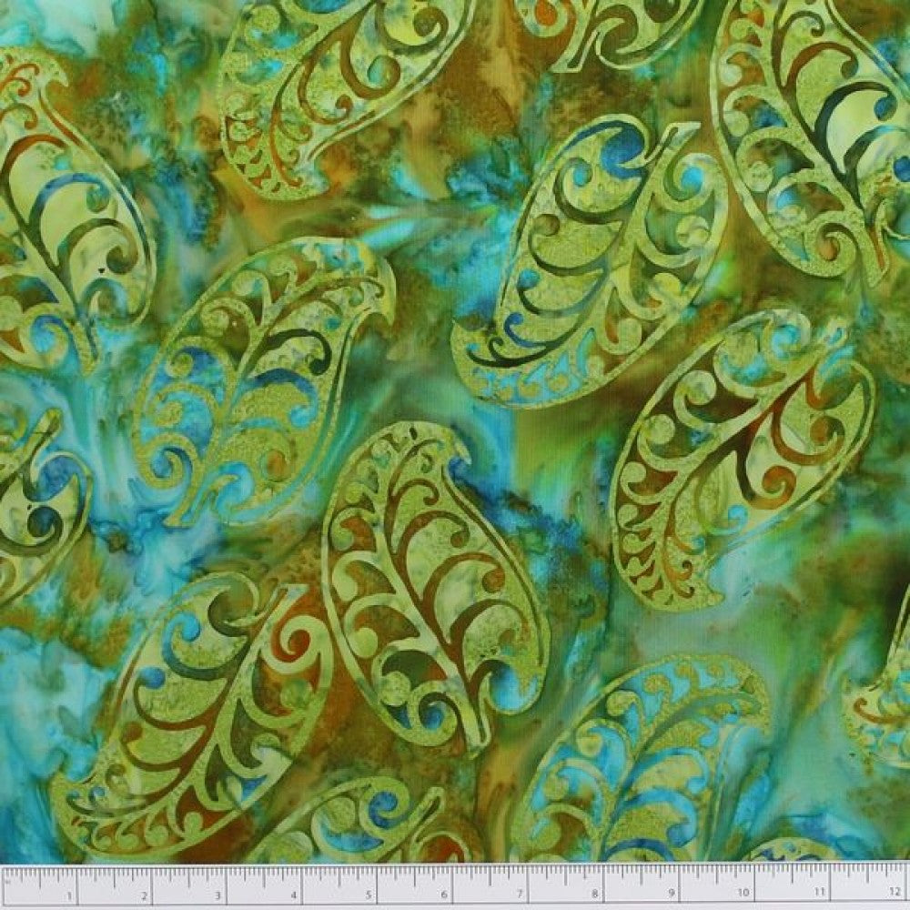 New Zealand designed quilt fabric with Maori style leaf design in green turquoise orange and rust