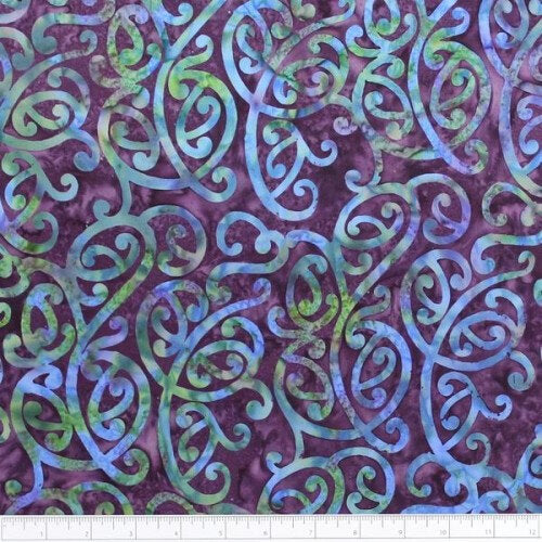 New Zealand designed quilt fabric with Maori style swirls design in turquoise green and purple