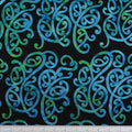 New Zealand designed quilt fabric with Maori style swirls design in turquoise and green on black