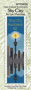 Cross-stitch kit for 'Sky City Auckland NZ' with a cityscape design on a blue background.