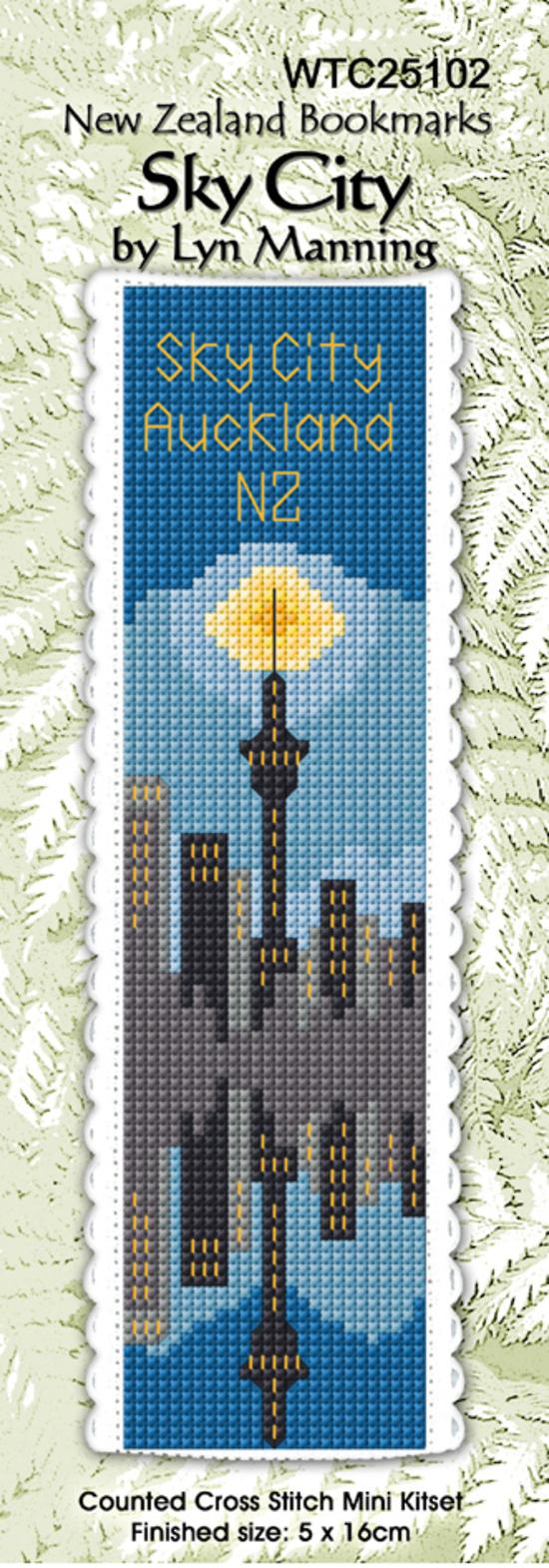 Cross-stitch kit for 'Sky City Auckland NZ' with a cityscape design on a blue background.