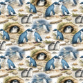 A repeating illustrated pattern of penguins in a beachy coastal scene, including standing penguins, pairs near nests, penguins in burrows, starfish, and driftwood motifs on a light sandy background.