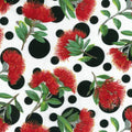 A close-up of a fabric pattern featuring bright red Pohutukawa flowers with green leaves on a white background with large black polka dots.