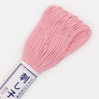 Skein of Olympus Sashiko Thread in colour pale pink on white backgound