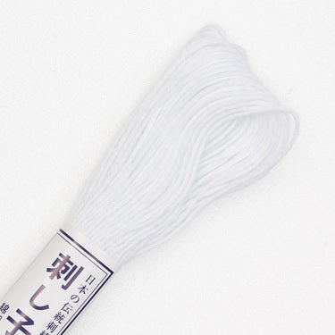 Skein of Olympus Sashiko Thread in colour white on a white background