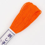 Skein of Olympus Sashiko Thread in colour bright orange on a white backgound