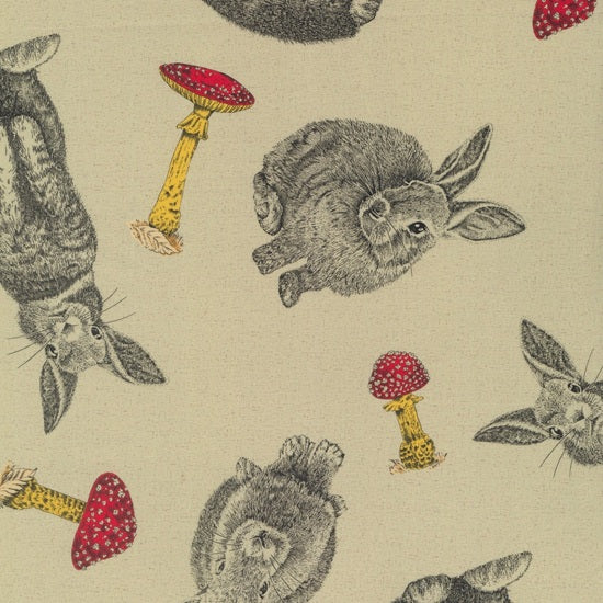 Pattern of rabbits and mushrooms on a beige background