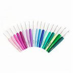 Set of colorful crochet hooks on a white background