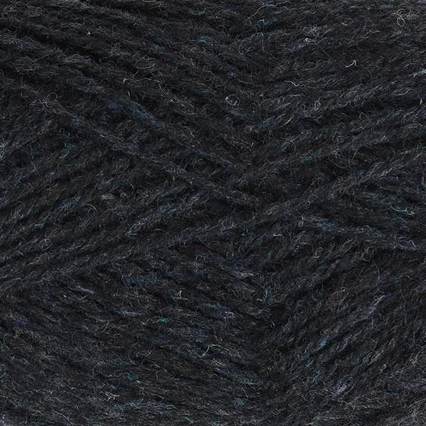 Close-up of dark navy-grey yarn with a tweedy texture