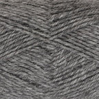 Close-up of medium gray yarn with a tweedy texture