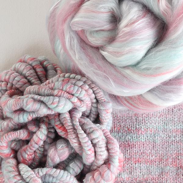 Picture of the packaging of 100 grams of New Zealand Merino and Silk unspun fibre dyed in multi-colour pastel pinks and ice blue