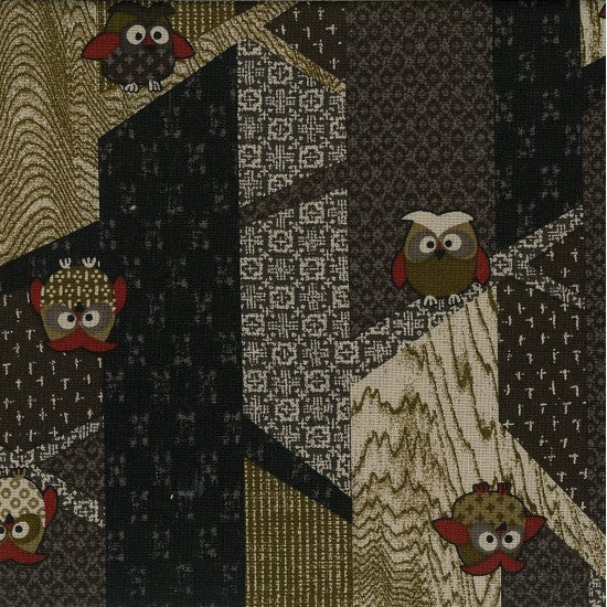 A fabric with a traditional Japanese design featuring multi-colored owls on a black and olive green background.