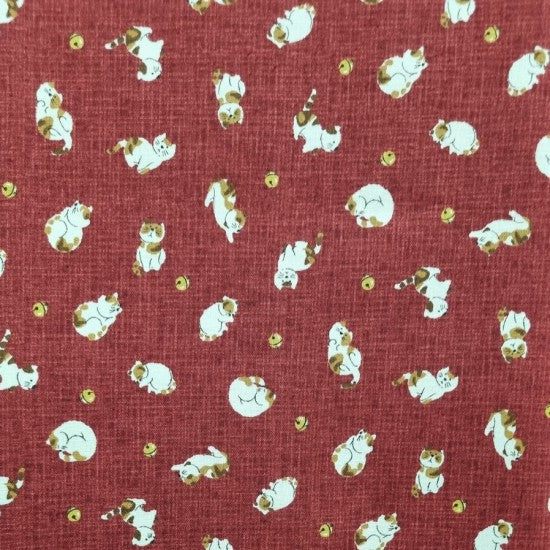 Traditional Japanese design featuring multi-colored cats and balls on a linen-look red background.