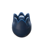 Navy blue tulip-shaped point protector on a white background