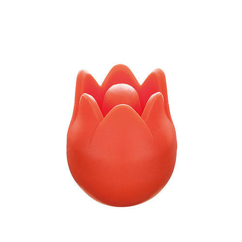 Orange tulip-shaped point protector on a white background