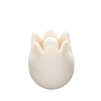 White tulip-shaped point protector on a white background