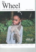 Magazine cover featuring a child wearing a knitted scarf with Ashford branding.