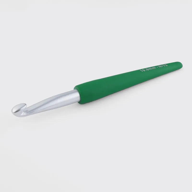 Dark green crochet hook on a white background