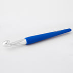 Colbalt blue crochet hook on a white background