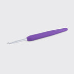 Purple-handled crochet hook on a light gray background