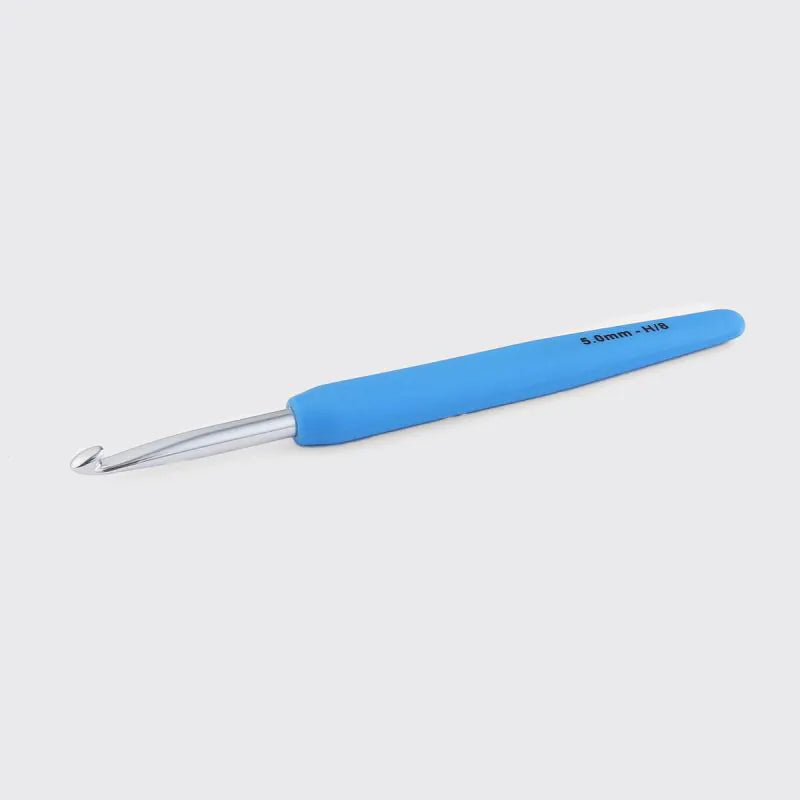 Blue crochet hook on a white background
