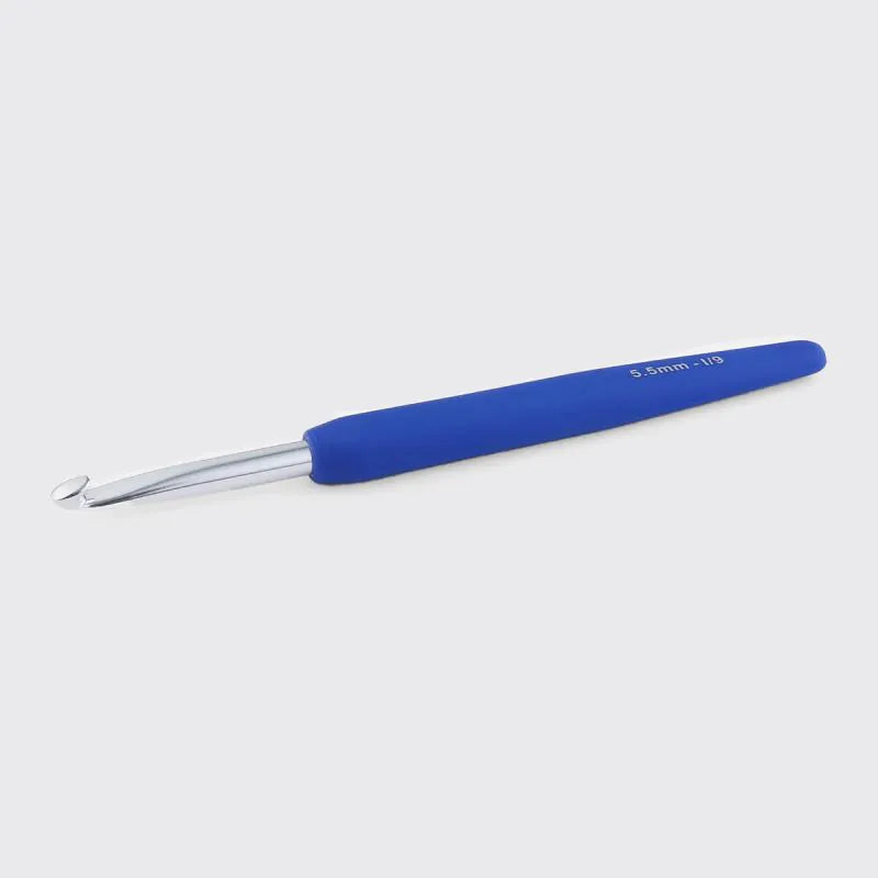 Blue crochet hook on a white background