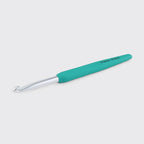 Teal crochet hook on a white background