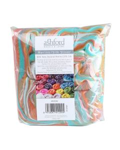 Picture of the packaging of 100 grams of New Zealand Merino and Silk unspun fibre dyed in multi-colours of the arizona desert rusts and turquoise
