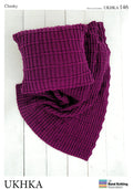 A purple chunky knit throw or cushion pattern displayed on a wooden background, with the brand name 'UKHKA' and the text 'Chunky' visible.