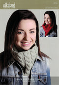 A person wearing a red and gray striped knitted cowl over a blue denim jacket.