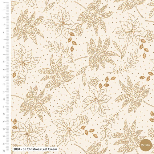 A Quilting fabric with a Christmas leaf design on a cream background