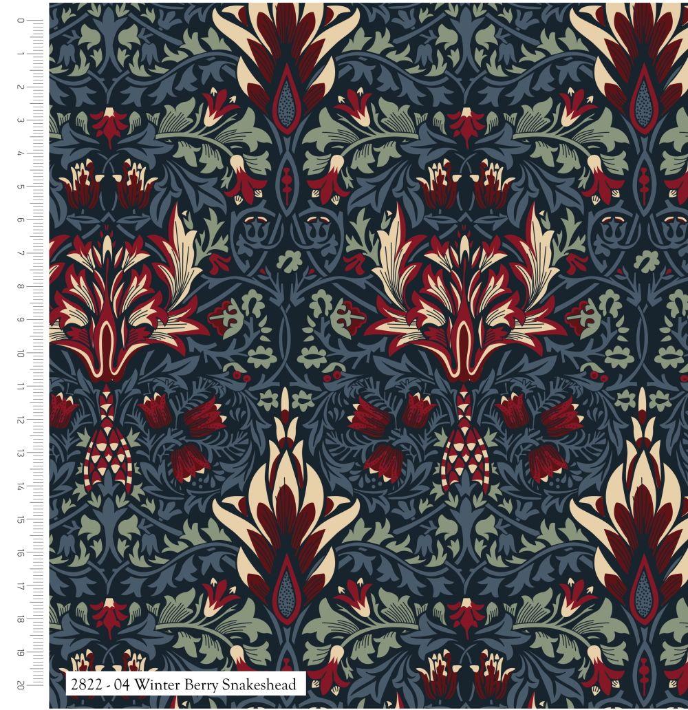 A Quilt  fabric featuring a floral and bird design with red, beige, and green colors on a navy background.