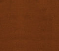 Close-up of heavy duty rust-colored denim fabric, for use in clothing or upholstery.