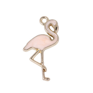 A gold-colored enamel charm in the shape of a flamingo with a pink body.