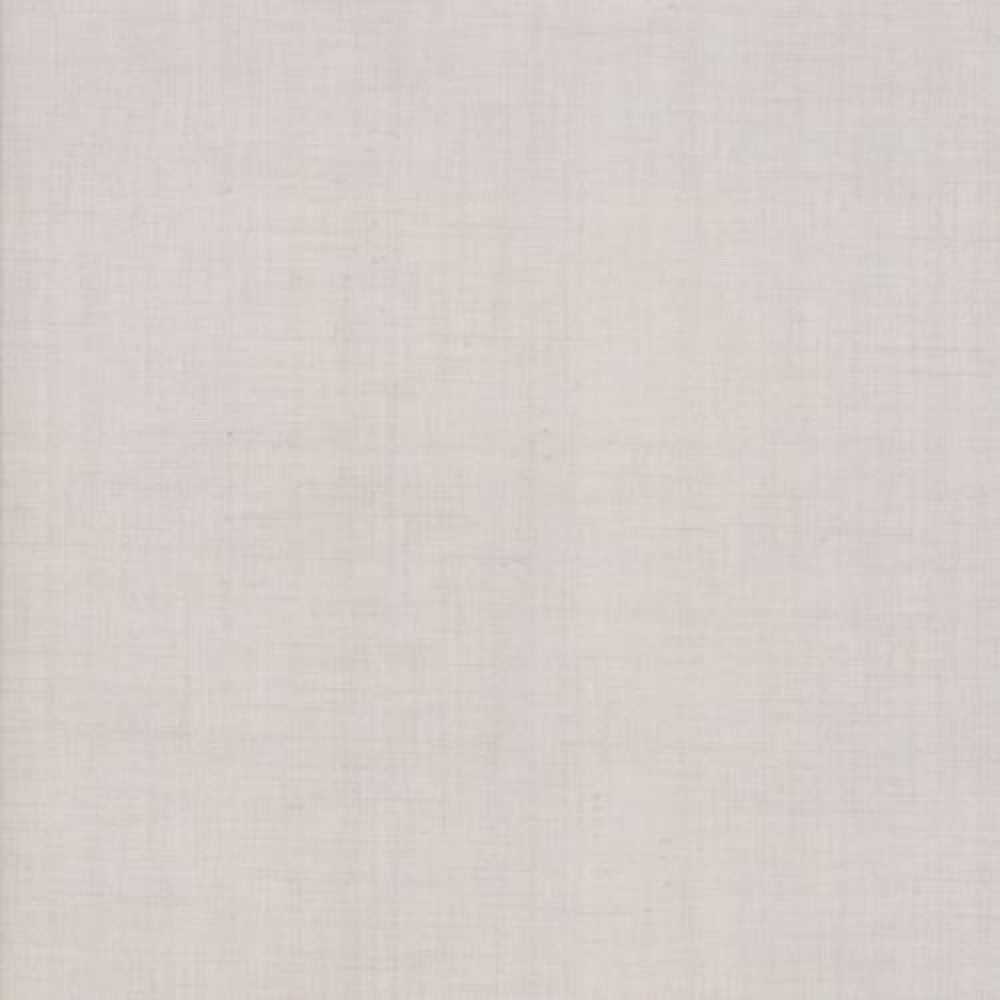 A solid smokey-grey colored blender quilting fabric from the French General collection.