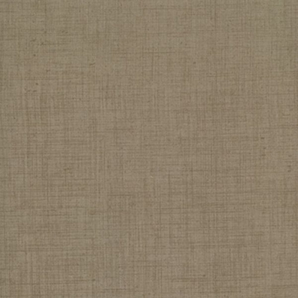 A textured quilting fabric swatch in a neutral beige color, likely to be used for quilting or sewing.
