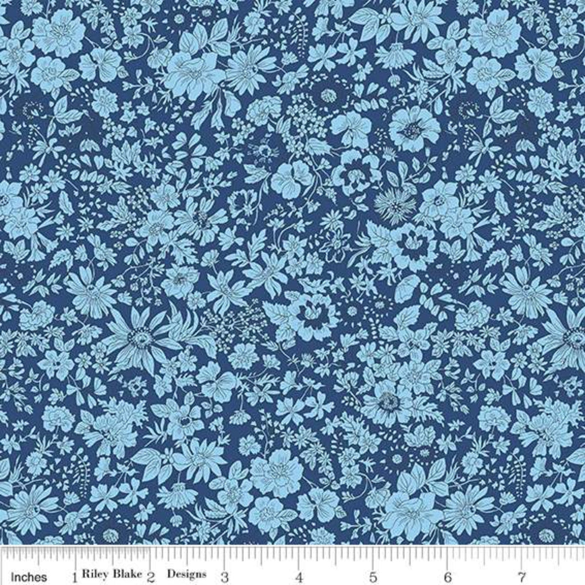 A blue cotton Quilting fabric with a geometric floral design designed by Liberty Fabrics.