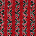 A Quilt Fabriced fabric featuring the Maori Koru design in black and white on a red background.