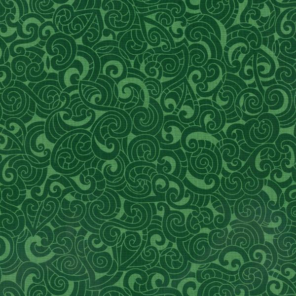Quilt fabric featuring a traditional Maori Moko design in emerald tones